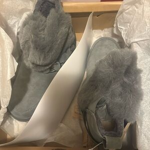 These short boots are completely waterproof.  They are brand new